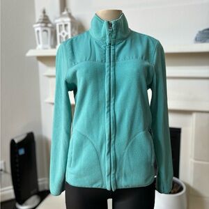 Turquoise colored jacket